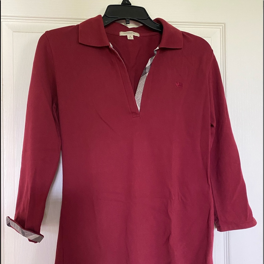 Burberry woman’s polo style shirt.